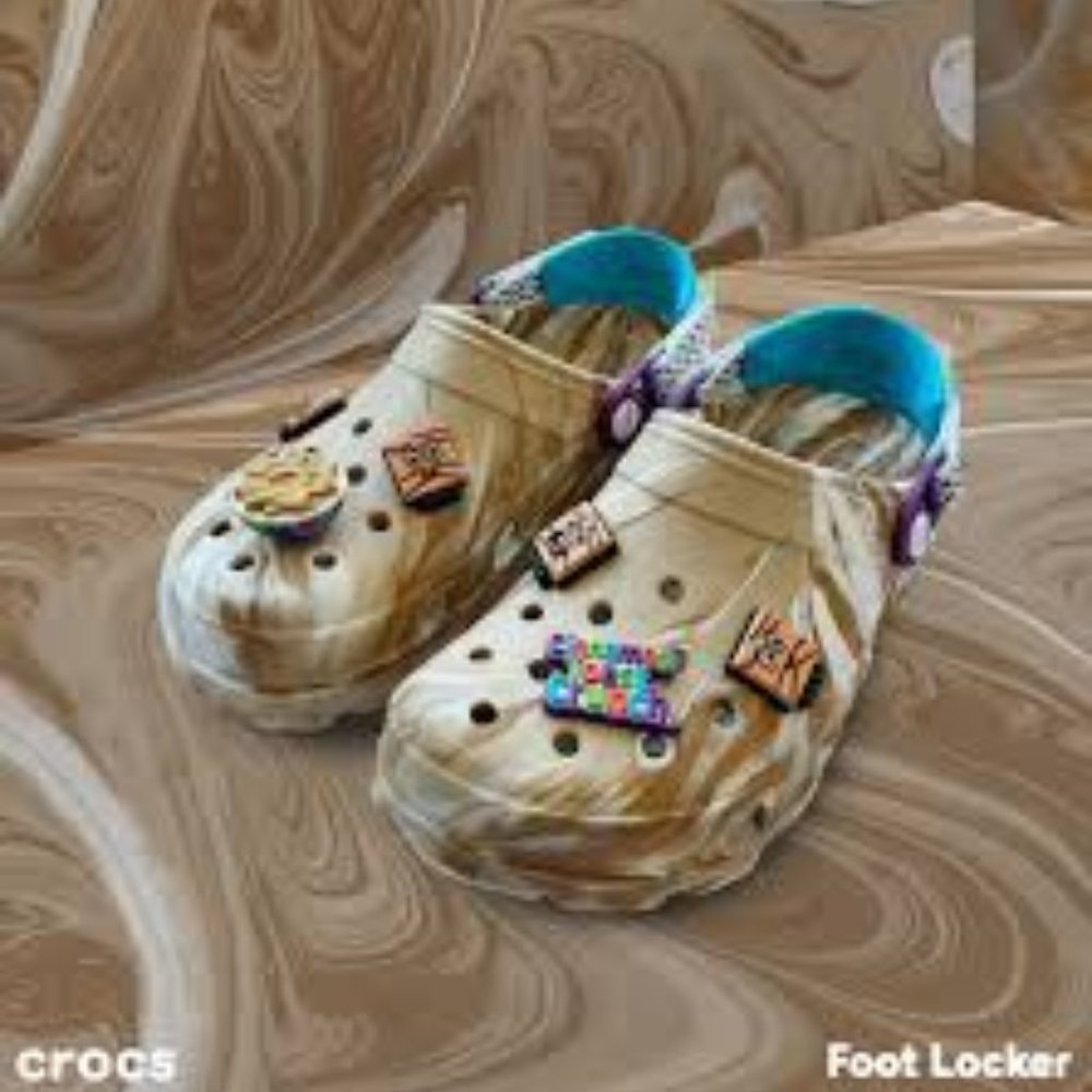 NEW. CROCS x CINNAMON TOAST CRUNCH. WOMEN'S SIZE 8 MEN’S SIZE 6.